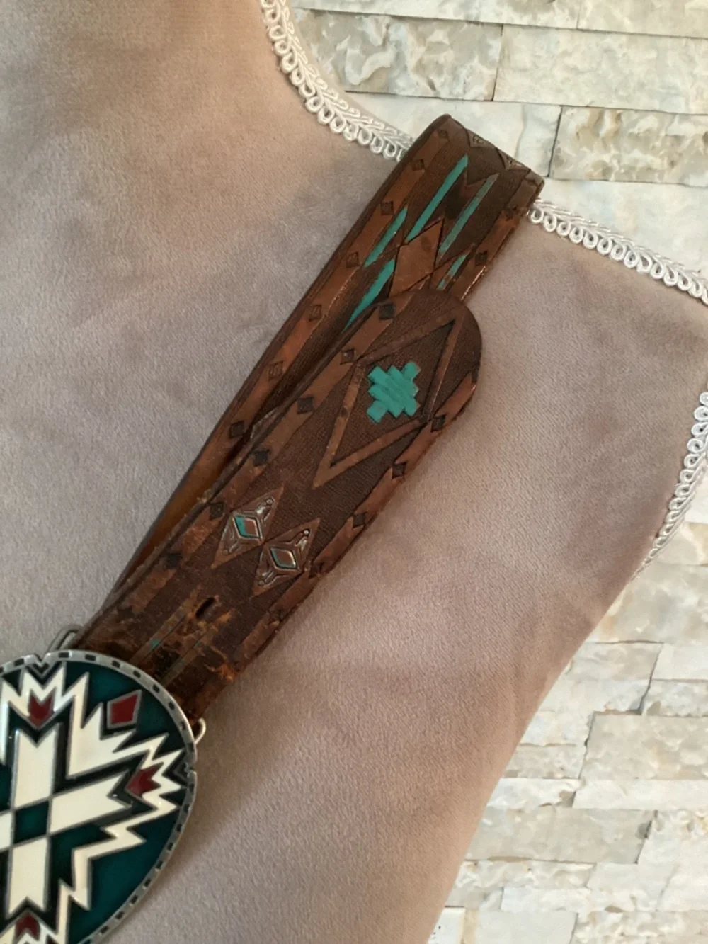 Vintage Siskiyou Buckle Co. enameled belt buckle paired with tooled leather belt